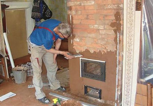 Штукатурка печи Прежде чем побелить печку, ее нужно покрыть слоем штукатурки