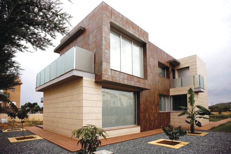 Облицовка керамогранитом Облицовка дома керамогранитом